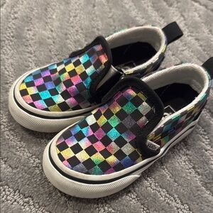 Vans Black Sneakers with Slip-On Design and Colorful Checkered Pattern